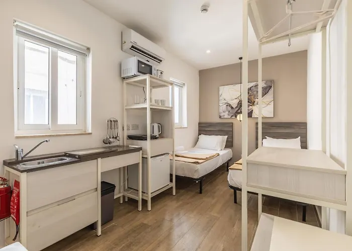 Studio Apartment With Twin Beds & Kitchenette At The New Olo Living 24 Saint Julian's